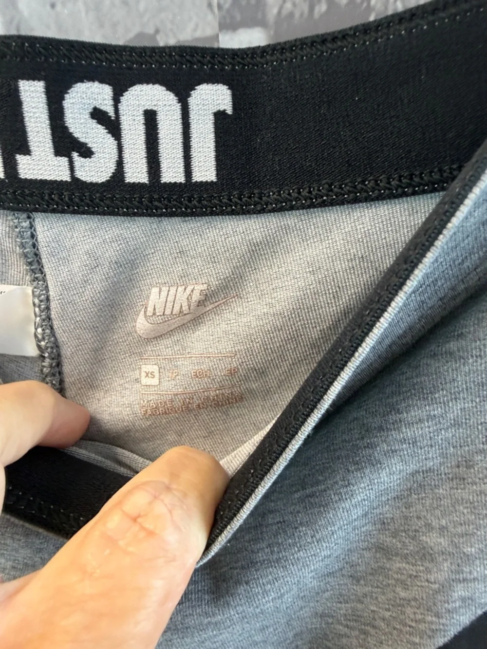 Nike Gray Athletic Leggings with Bold Black Graphic